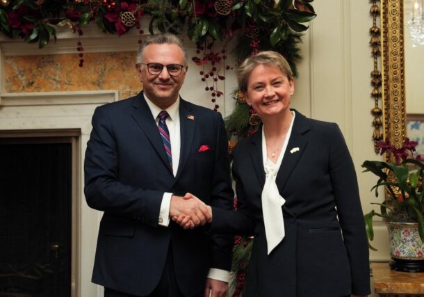 UK Foreign Minister Yvette Cooper shakes hands with US Senior Advisor for Africa on Dec 10, 2025
