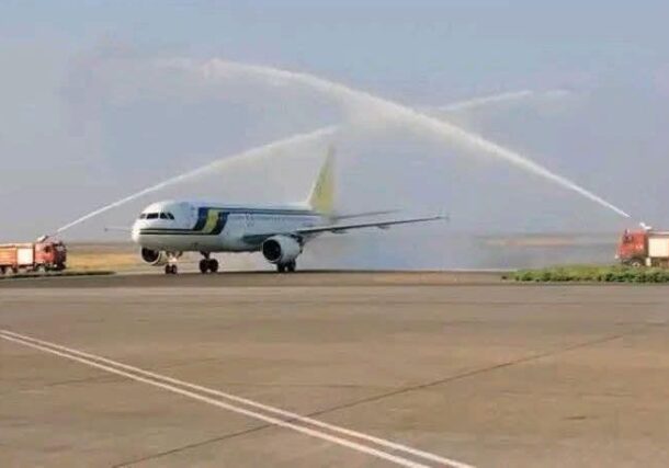 A Sudan Airways Airbus receives a traditional water cannon salute upon its arrival at Port Sudan International Airport on January 24, 2026