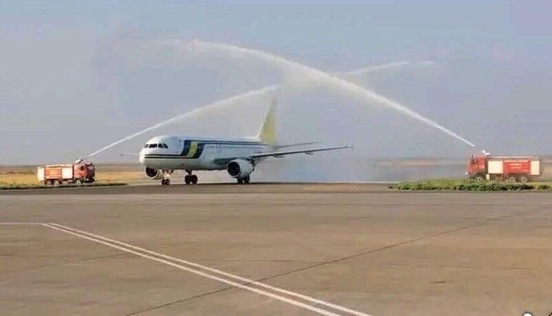 A Sudan Airways Airbus receives a traditional water cannon salute upon its arrival at Port Sudan International Airport on January 24, 2026