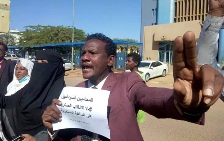 A Sudanese lawyer protests against military rule and demands accountability for violence against demonstrators in front of the High Court in Khartoum in this file photo from November 2021. AFP photo
