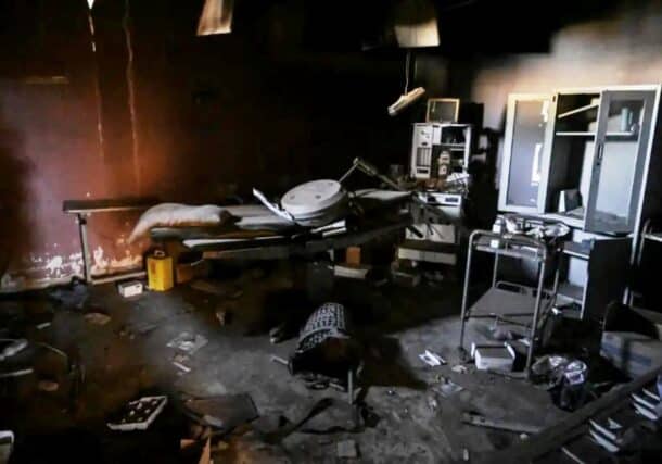 A ransacked emergency room at Ibrahim Malik Hospital illustrates the severe damage to Khartoum's medical infrastructure.