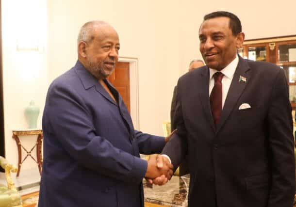 Djibouti’s President Guelleh shakes hands with Sudanese PM Idris in Djibouti on Jan 28, 2026 ADI photo.