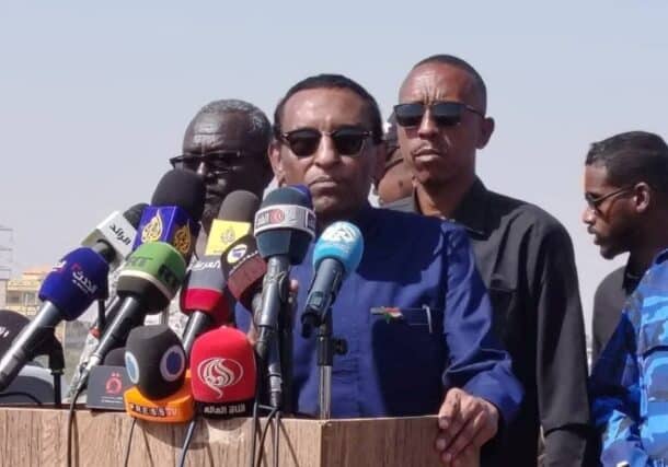 Sudanese Prime Minister Kamil Idris speaks outside his office in Khartoum to announce the official return of the federal government to the capital, January 11, 2026.