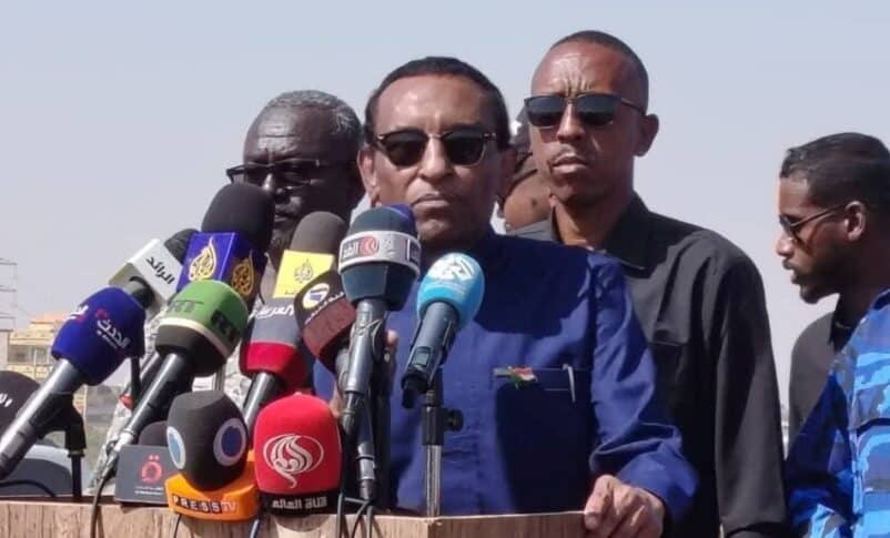Sudanese Prime Minister Kamil Idris speaks outside his office in Khartoum to announce the official return of the federal government to the capital, January 11, 2026.