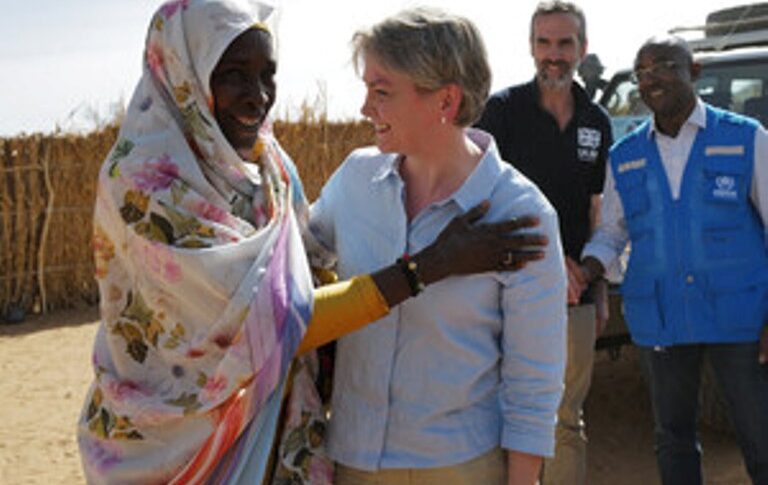 Foreign Secretary Yvette Cooper greets a Sudanese refugee in Adré, on Feb 3, 2026 FCO photo.