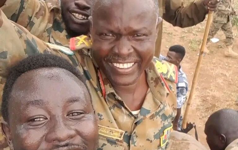 Major General Faisal Mukhtar al-Sair, commander of the 14th Infantry Division in Kadugli poses with troops as they broke siege of the city on Feb 3, 2026