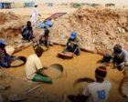 Sudanese men pan for gold at the village of al-Abidiya in northern Sudan in 2010. AFP photo