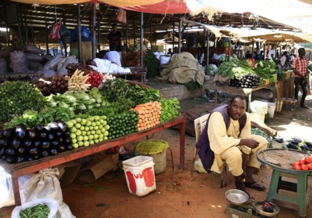 Vendors sell vegetables and fruits at a market in Khartoum, Sudan, Jan. 8, 2022. Xinhua photo