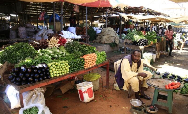 Vendors sell vegetables and fruits at a market in Khartoum, Sudan, Jan. 8, 2022. Xinhua photo