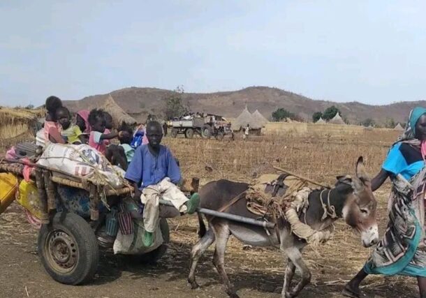 Civilians flee Kurmuk in Sudan’s Blue Nile state after the Rapid Support Forces (RSF) seized control of the town, March 26, 2026.