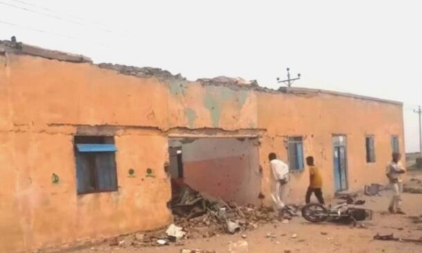 Residents at the scene of a drone strike that targeted a school in Shikiri, White Nile State, March 11, 2026.
