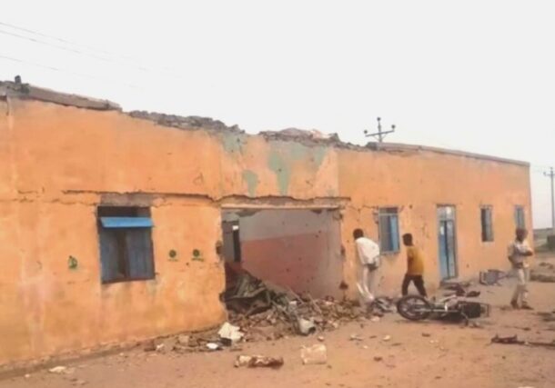 Residents at the scene of a drone strike that targeted a school in Shikiri, White Nile State, March 11, 2026.
