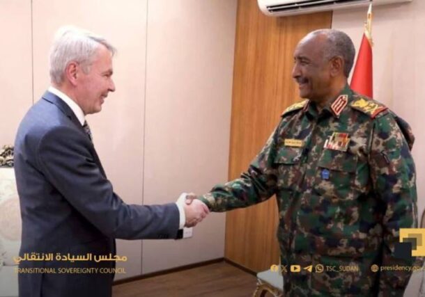 Sudan's Sovereign Council head Abdel Fattah al Burhan welcomes UN envoy for Sudan Pekka Haavisto, on March 25, 2026