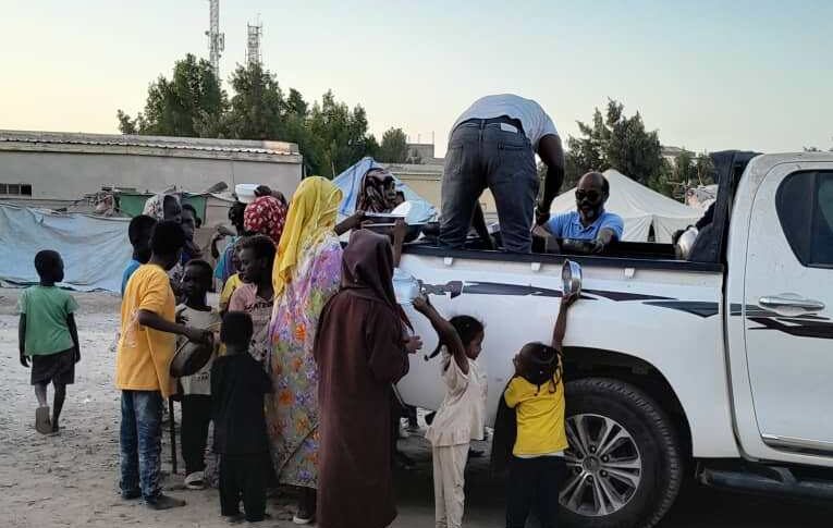 Three years into the conflict, internally displaced persons gather for Ramadan Iftar in Port Sudan, March 4, 2026.