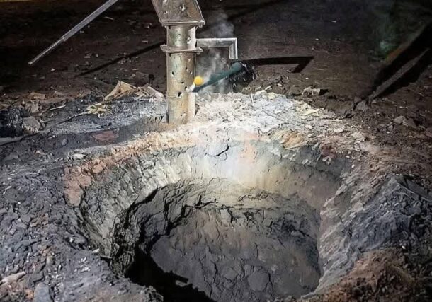 A deep crater caused by the explosion of a war remnant in eastern Khartoum on Friday night, April 3, 2026