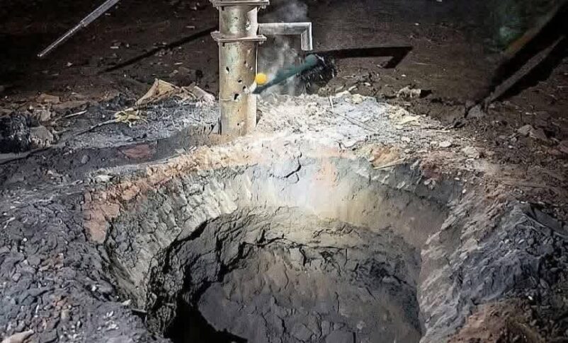 A deep crater caused by the explosion of a war remnant in eastern Khartoum on Friday night, April 3, 2026
