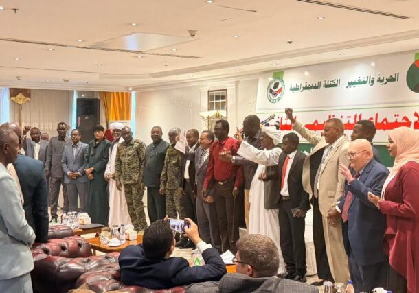 Democratic Bloc leaders pose after the signing of the amended status of the alliance, April 26, 2026