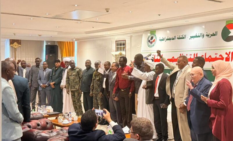 Democratic Bloc leaders pose after the signing of the amended status of the alliance, April 26, 2026