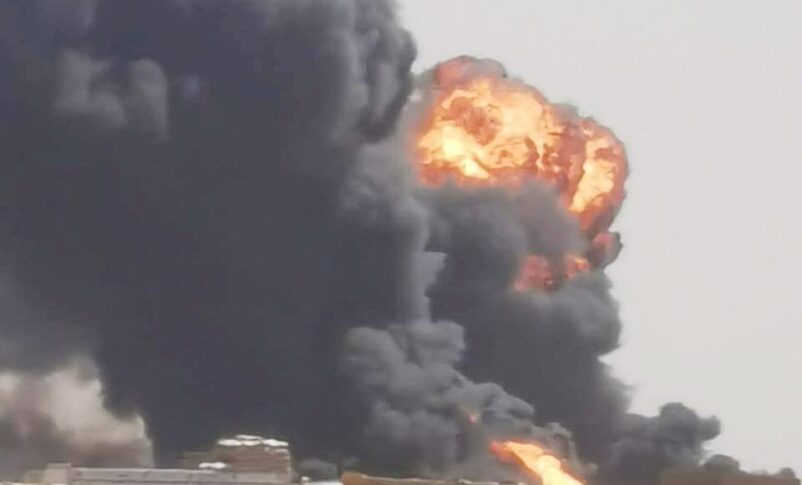 Thick black smoke and a massive fireball rise above the Adukong border crossing in West Darfur following a drone strike on March 12, 2026.