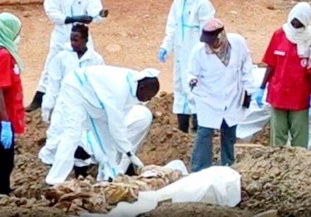 Health workers transfer bodies buried in Khartoum streets to official cemeteries, file photo