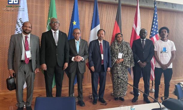 Representatives of a pro-peace civilian coalition "Somoud" pose in Berlin on April 15, 2026