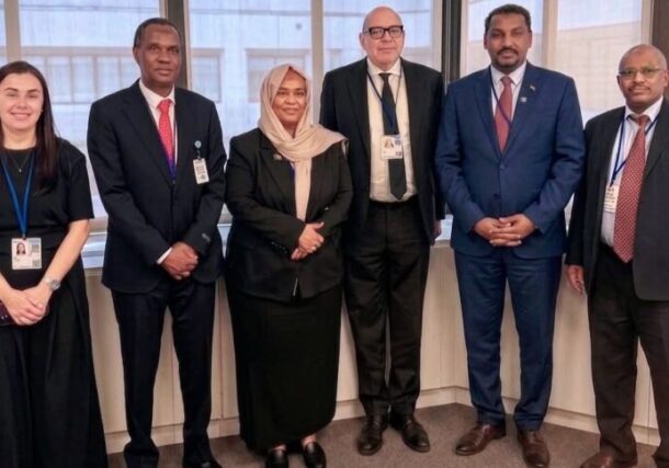 Sudanese delegation pose with the Wold Bank official after a meeting on April 18, 2026