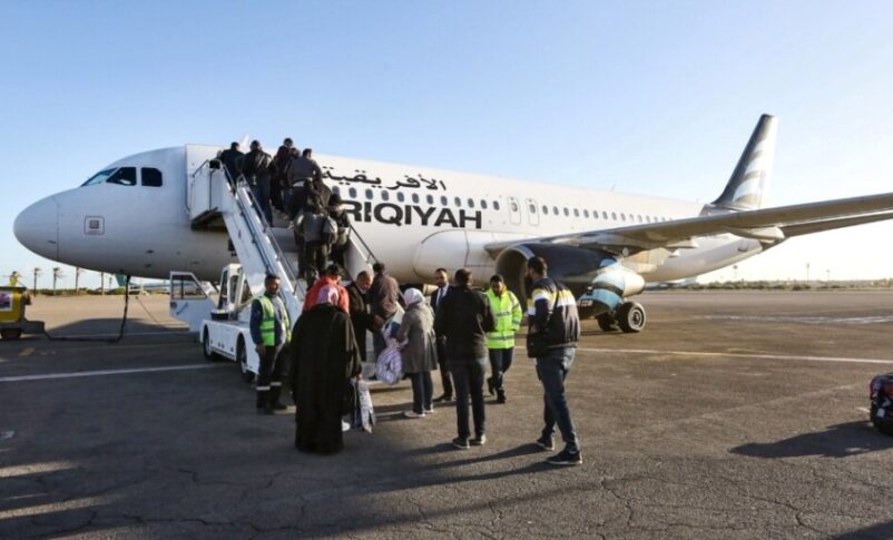 Passengers board an aircraft at Mitiga International Airport, located east of Tripoli, Libya, on December 12, 2019, AFP photo