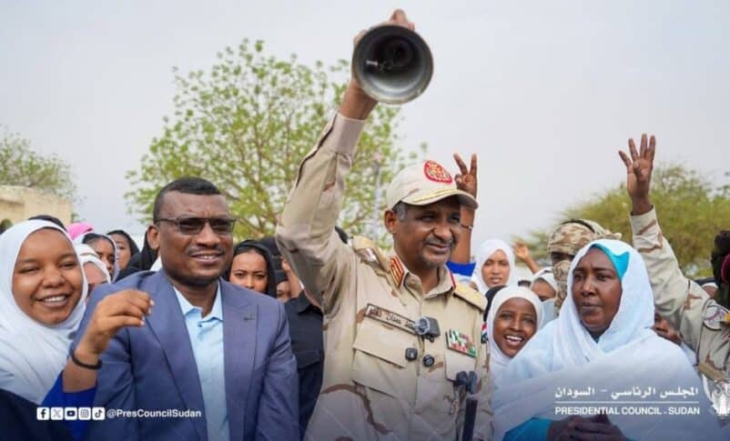 RSF Commander Mohamed Hamdan Dagalo, known as Hemetti, rings a bell to launch school examinations at the Al-Wahda Secondary School for Girls in Nyala, South Darfur, on June 7, 2026.