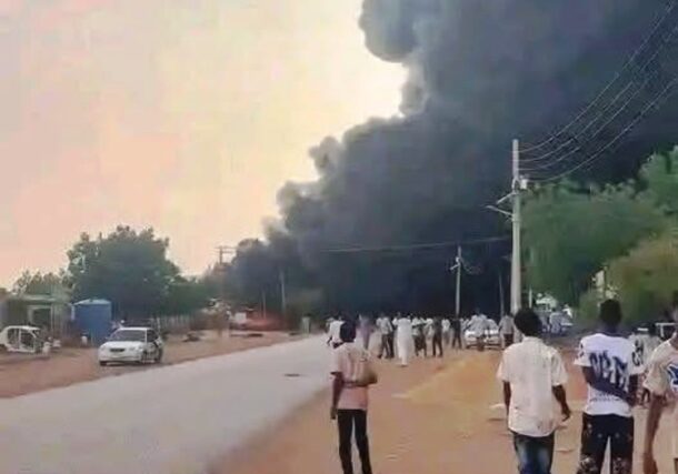 A massive plume of black smoke rises into the sky following an RSF drone strike on a fuel station in El Obeid, North Kordofan, Sudan