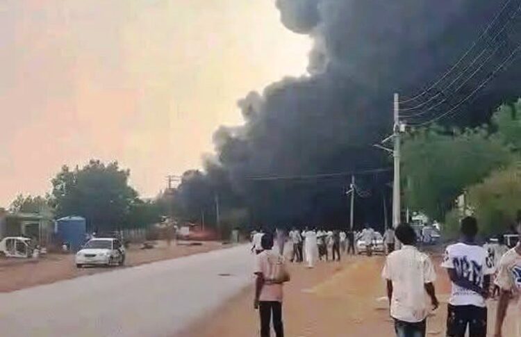 A massive plume of black smoke rises into the sky following an RSF drone strike on a fuel station in El Obeid, North Kordofan, Sudan