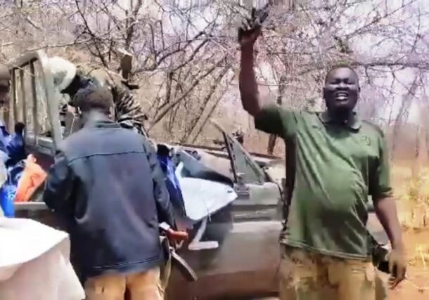 Sudanese army soldiers stand next to a captured military vehicle following clashes outside Amouri in the Blue Nile region, June 13, 2026.