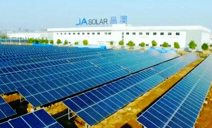 An aerial view shows rows of solar panels installed at a JA Solar facility in Beijing, China