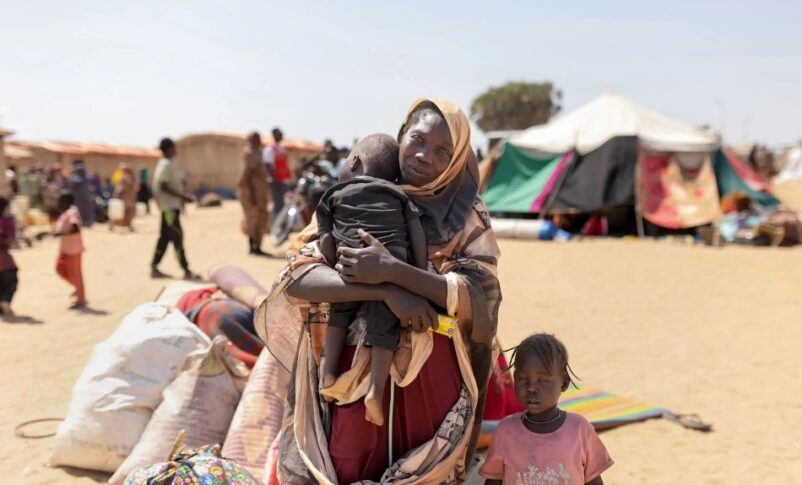 On 16 February, 2026 Halima with her youngest two-year-old son Samsadeen and four-year-old Intenan, upon arrival at Goz Alsalam IDP site in White Nile State. UNICEF photo