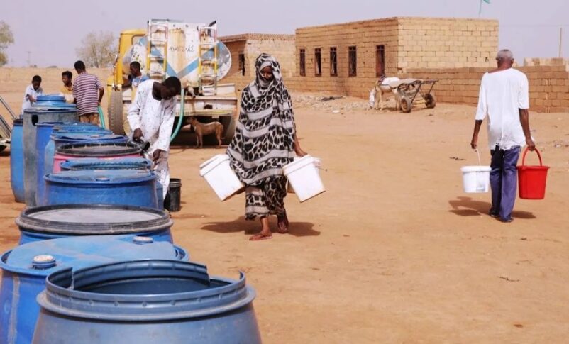 People fill water containers at a free distribution point amid water outages in Khartoum, Sudan, May 18, 2026. AP photo