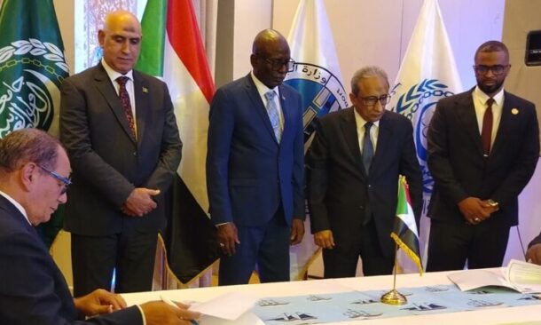 Senior Arab League and Sudanese official attend the signing ceremony of an agreement to rebuild Sudan's transport sector and infrastructure in Khartoum on July 27, 2026
