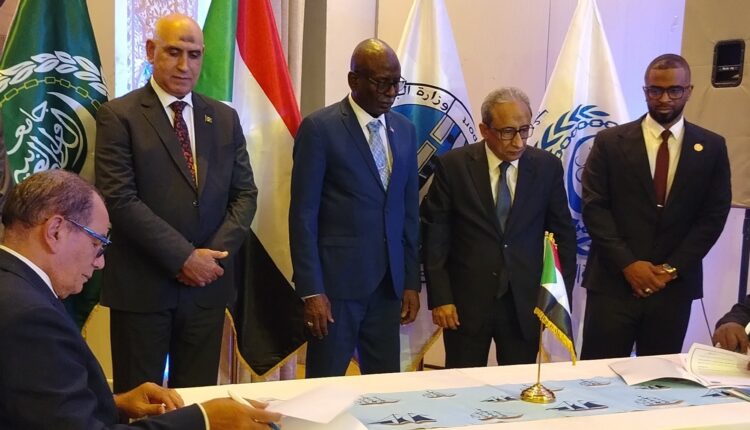 Senior Arab League and Sudanese official attend the signing ceremony of an agreement to rebuild Sudan's transport sector and infrastructure in Khartoum on July 27, 2026