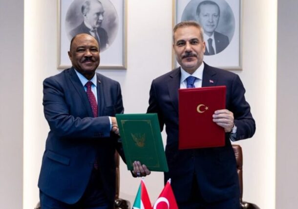 Sudanese FM Mohieddin Salem and his Turkish counterpart Hakan Fidan shake hands after signing a diplomatic cooperation protocol in Ankara on July 28, 2026