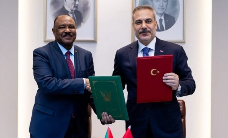 Sudanese FM Mohieddin Salem and his Turkish counterpart Hakan Fidan shake hands after signing a diplomatic cooperation protocol in Ankara on July 28, 2026