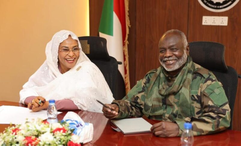 Sudan's Finance Minister Gibril Ibrahim and Central Bank of Sudan Governor Amna Mirghani attend a meeting announcing a banking finance portfolio for the summer agricultural season, in Khartoum, July 9, 2026.