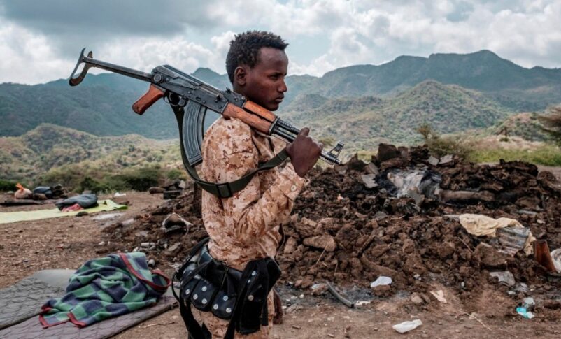A member of the Afar Special Forces in front of the debris of a house in Tigray Region on December 9, 2020 AFP photo