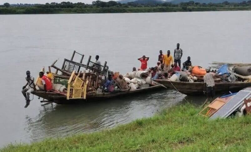 Civilians flee by boat from Adasi area, blue Nile region to Kambal, on the eastern bank on August 16, 2026