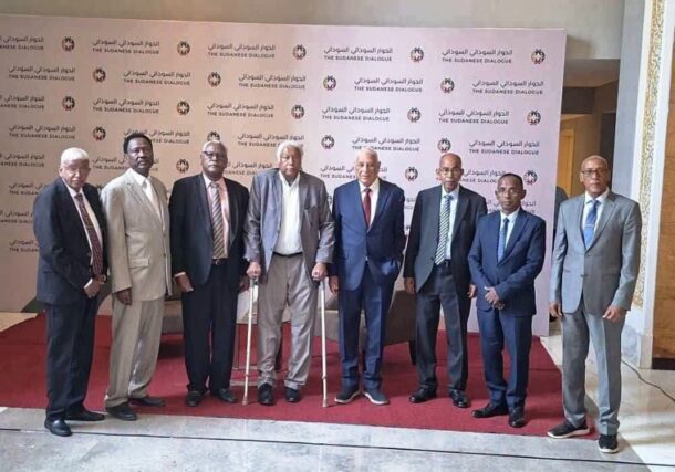 Members of the dialogue preparatory committee pose for a photograph following a news conference in Khartoum, Sudan, August 30, 2026.