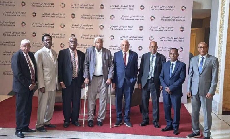 Members of the dialogue preparatory committee pose for a photograph following a news conference in Khartoum, Sudan, August 30, 2026.