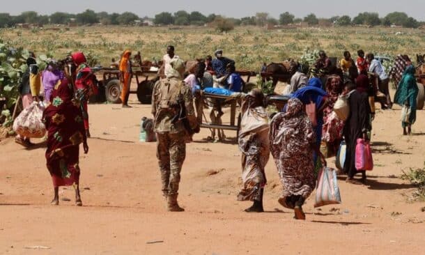 Families arrive in Adré, Chad, on November 7, 2023, after fleeing Ardamata in West Darfur, where survivors reported executions and looting by the RSF and allied Arab militias.