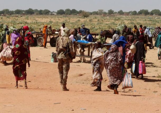 Families arrive in Adré, Chad, on November 7, 2023, after fleeing Ardamata in West Darfur, where survivors reported executions and looting by the RSF and allied Arab militias.
