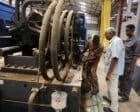 Industrial workers repair a production line at an electrical appliances factory in the Bahri area of Khartoum. October 15, 2025. Reuters photo