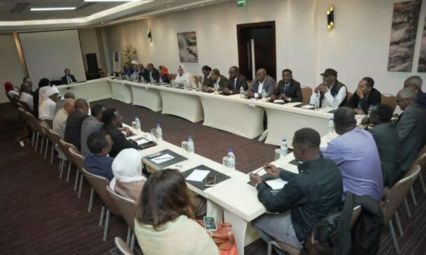 Representatives of Sudanese political forces attend a meeting to discuss a call for dialogue by Sudan's army chief Abdel Fattah al-Burhan, in Addis Ababa, Ethiopia, August 22, 2026.
