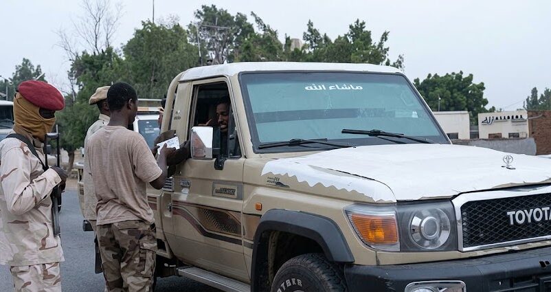 RSF members control vehicles in Nyala streets on August 17, 2026