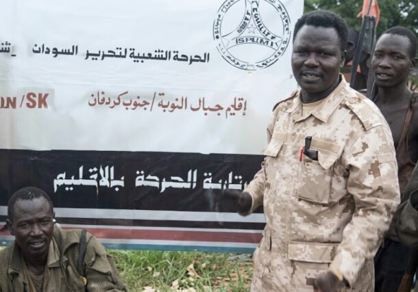 SPLM-N Fighters stand outside the group's secretariat building in Kauda, South Kordofan, in this still image taken from a video released on August 26, 2026