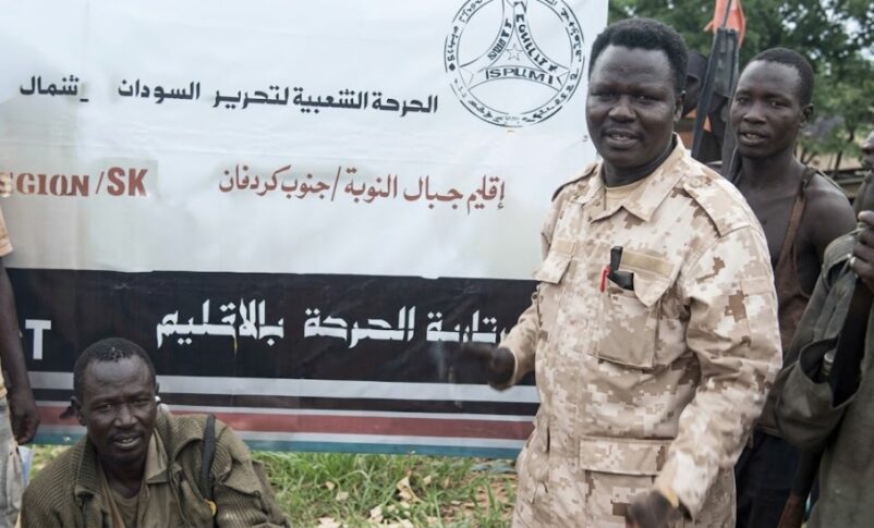 SPLM-N Fighters stand outside the group's secretariat building in Kauda, South Kordofan, in this still image taken from a video released on August 26, 2026